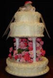 triple tier wedding cake with flowers